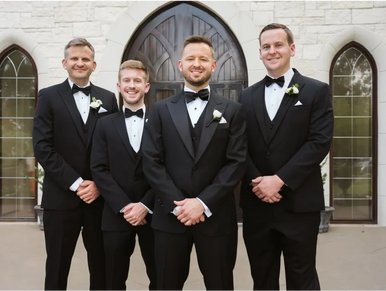 Four men in wedding attire