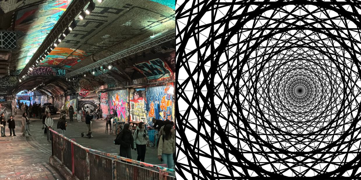 People walking in a graffiti-covered urban tunnel with vibrant street art.