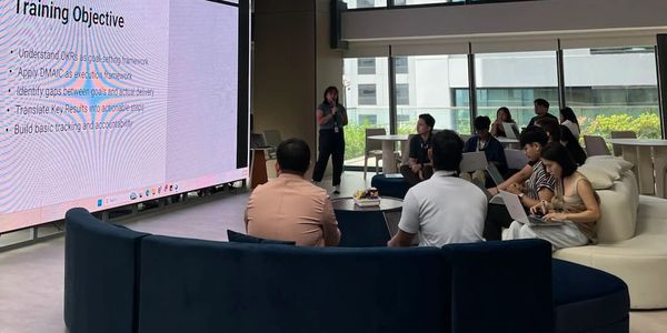 Team attending a training session in a modern office space.