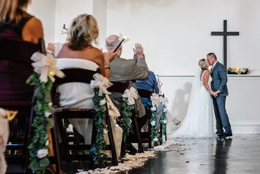 Bride and Groom down the aisle