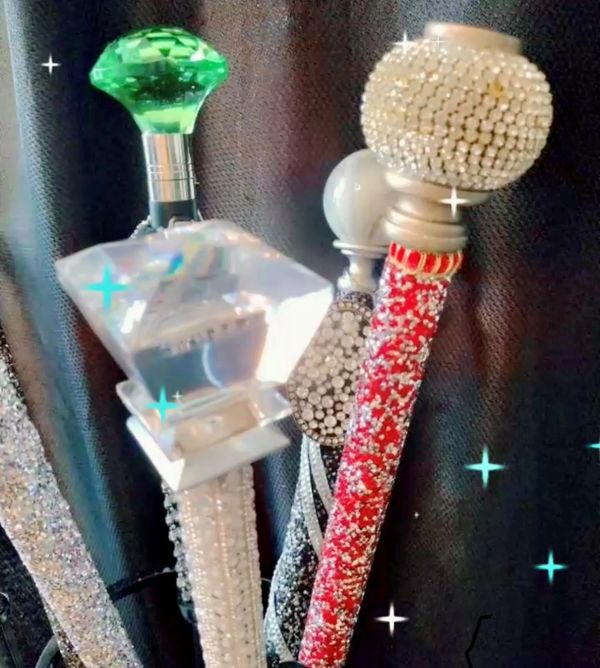Decorative and sparkly walking canes with jeweled handles.