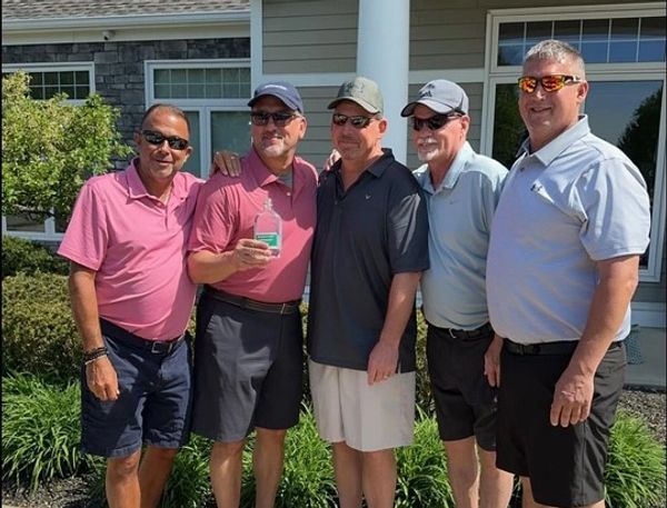 Friends of Bill Benton posing for picture