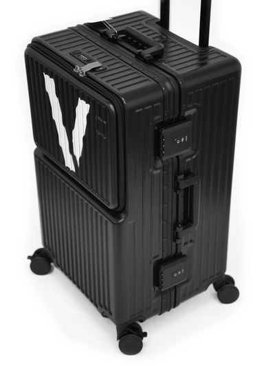 Black suitcase with a white 'V' on the top front.