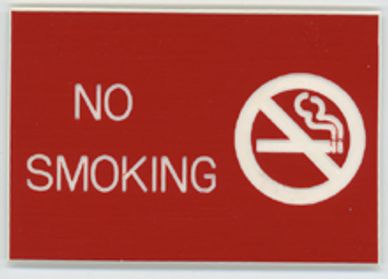 Red no smoking sign with cigarette icon crossed out.