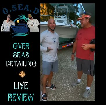 Two people talking in front of a boat and cleaning products by a polisher.