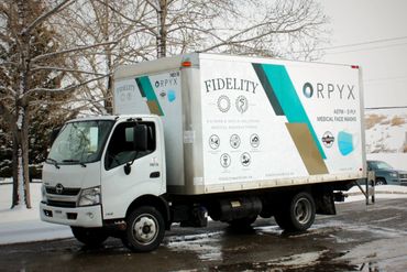 Fidelity Cube Van with Branded Wrap, car wrap, graphic design, custom decals, car graphics Calgary