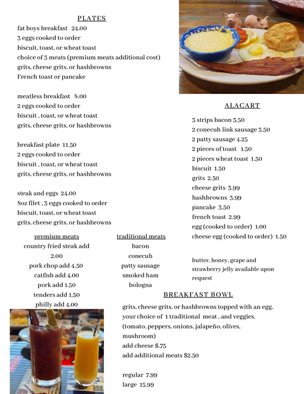 Breakfast plate with eggs, bacon, grits, biscuit, and tomato, and a menu of breakfast items.