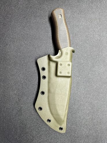 I designed this sheath to be compact as possible & to be able to hold many, many attachments.