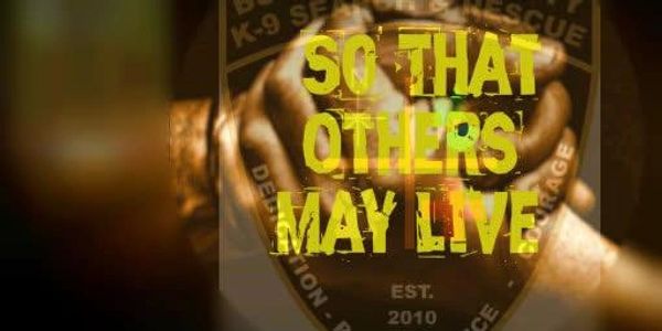 Hands clasped in solidarity with a rescue team's motto overlay.