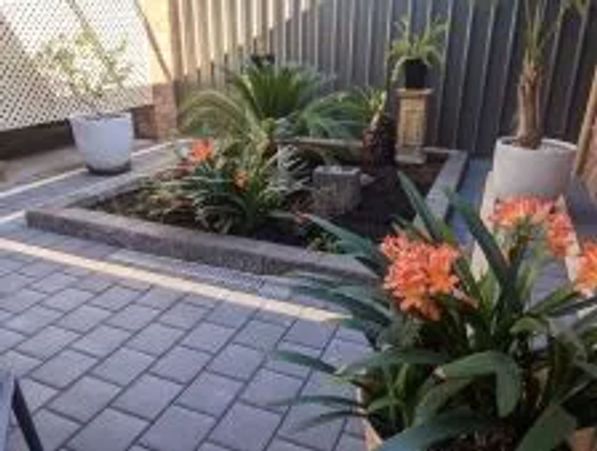 paved patio area using charcoal concrete pavers in Adelaide
