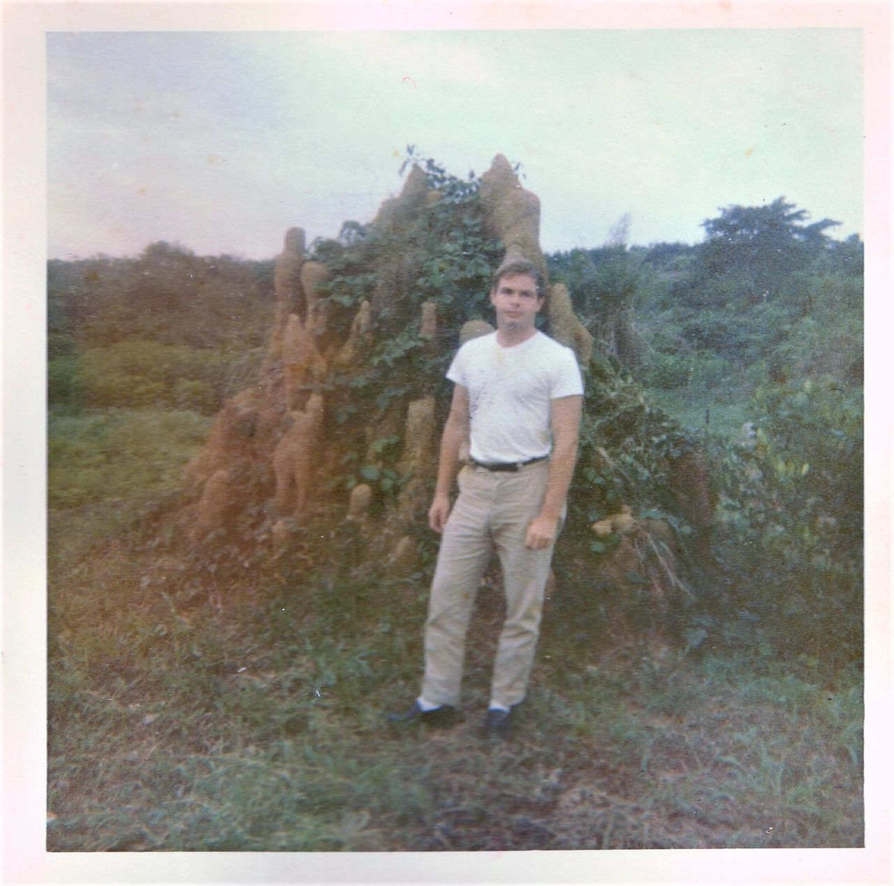 Standing in front of a bug-a-bug hill