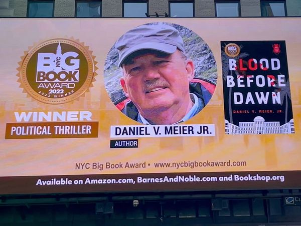 BLOOD BEFORE DAWIN - - WINNER IN THE NYC BIG BOOK AWARD.  BILLBOARD IN TIME SQUARE