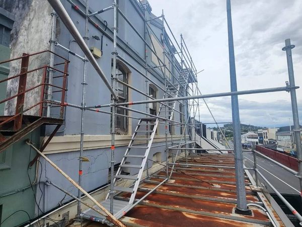 Access and edge protection for roof repairs on a commercial building in Whangarei