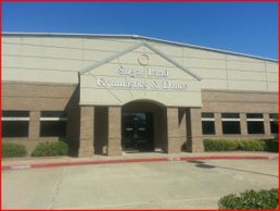 Front view of Super Land Counseling &amp; Testing building on a clear day.