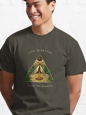A young man wearing a camping design tee.