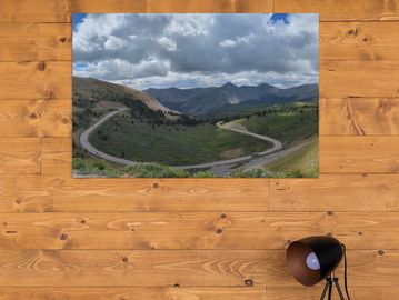 An image of a mountain road wall print.