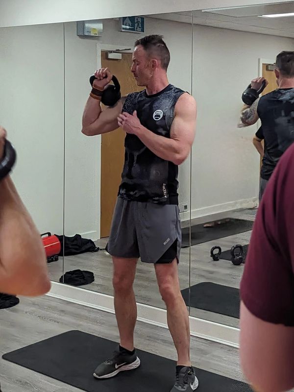 Richard Slocock teaching kettle bells at Staywell health Derby 