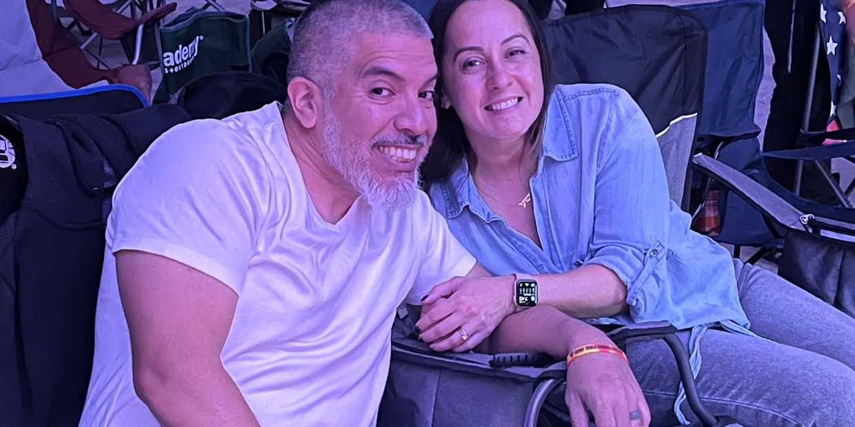 Happy couple smiling at Texas Tabernacles a Sukkot hosted by Messiah Texas Couples Date Night 