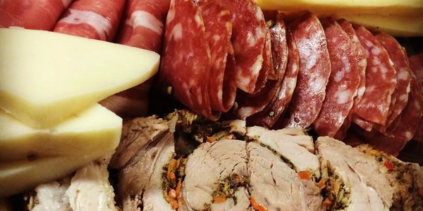 Assorted charcuterie with meats and cheese.
