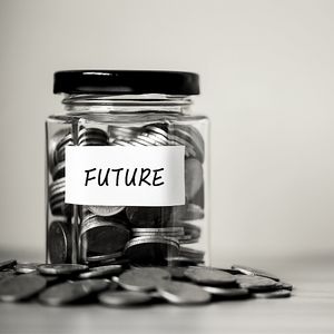 A jar with money and labeled "Future"