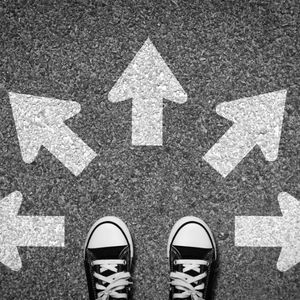 image of 2 feet and arrows pointing in different directions