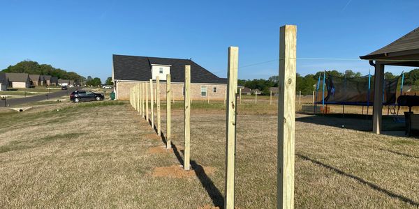 Professionally set 4x4 post for new fencing.