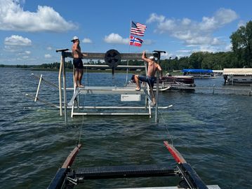 Storm Damage, recovery, fixing, dock replacement, flipped over boat lift, high winds, tornado, sunk