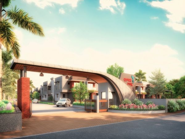 Modern residential complex entrance with curved architectural design and greenery, Premium 3 BHK