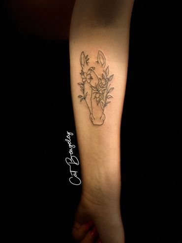 Delicate horse and flower tattoo by cat Beazeley tattoo 