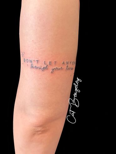 Cute script tattoo by Cat Beazeley - don’t let anyone tarnish your tiara 
