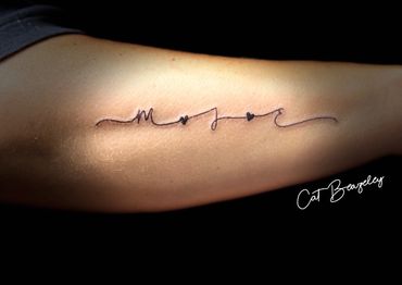 Initial tattoo in fine lines by Cat Beazeley tattoo 