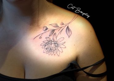 Cute chrysanthemum collarbone tattoo by Cat Beazeley 
