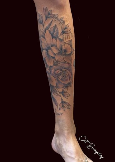 Gorgeous floral shin piece by Cat Beazeley tattoo 