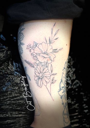 Gorgeous fine like floral bouquet by Cat Beazeley tattoo 