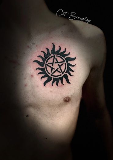 First tattoo done by Cat Beazeley Tattoo, supernatural chest piece 