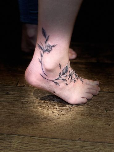 Gorgeous floral ankle piece by Cat Beazeley Tattoo