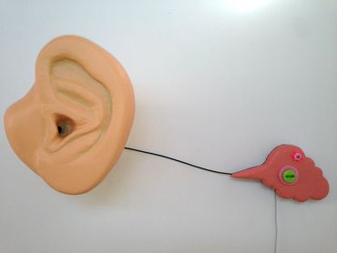 fabricated large ear sound art interactive wall sculpture