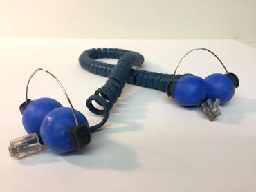 Mixed media, telephone cord, wire