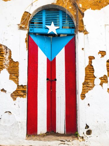 Door painted with Puerto Rican flag colors.