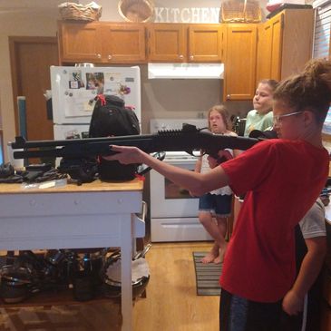 Kids learning about firearms