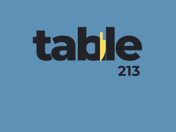 Logo with the word "table" and a knife illustration as the letter "l".