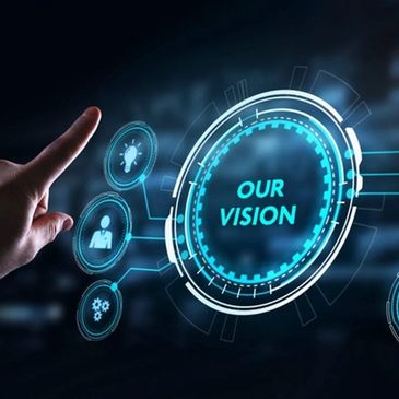 Futuristic interface displaying 'Our Vision' with a finger pointing towards it.