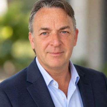Professional man in suit with blue eyes.