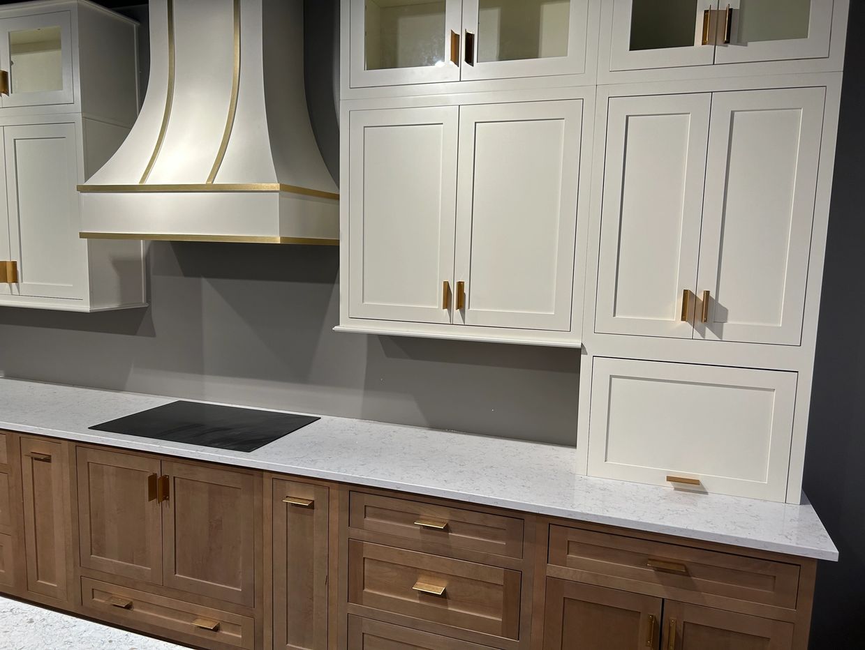 Inset cabinets, custom hood, induction cooktop expertly installed by Level Up.