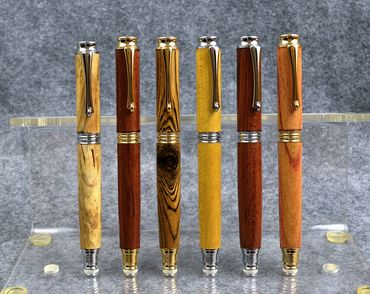 Various woods make up this selection of Metro pens that are either rollerball or fountain pen.