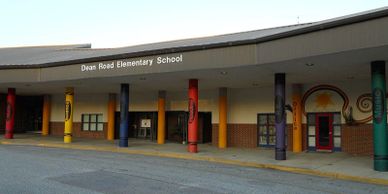 Dean Road Elementary School serves Kindergarten - 2nd grade. DRES Building Front Exterior 