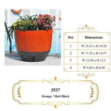 Orange and matt black glaze planter pot at succulent world/Miami Florida
