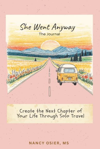 Journal cover with a van driving toward mountains at sunset.