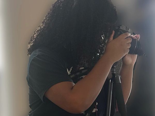 Coach Carrington photographing headshots for a client.