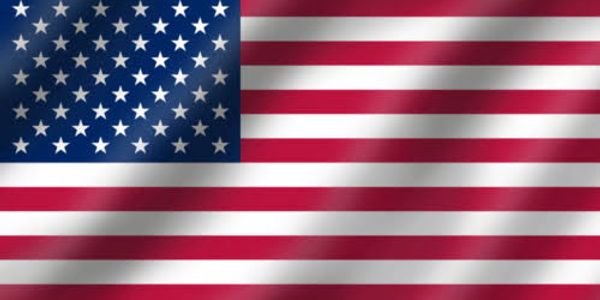 The flag of the United States with stars and stripes.